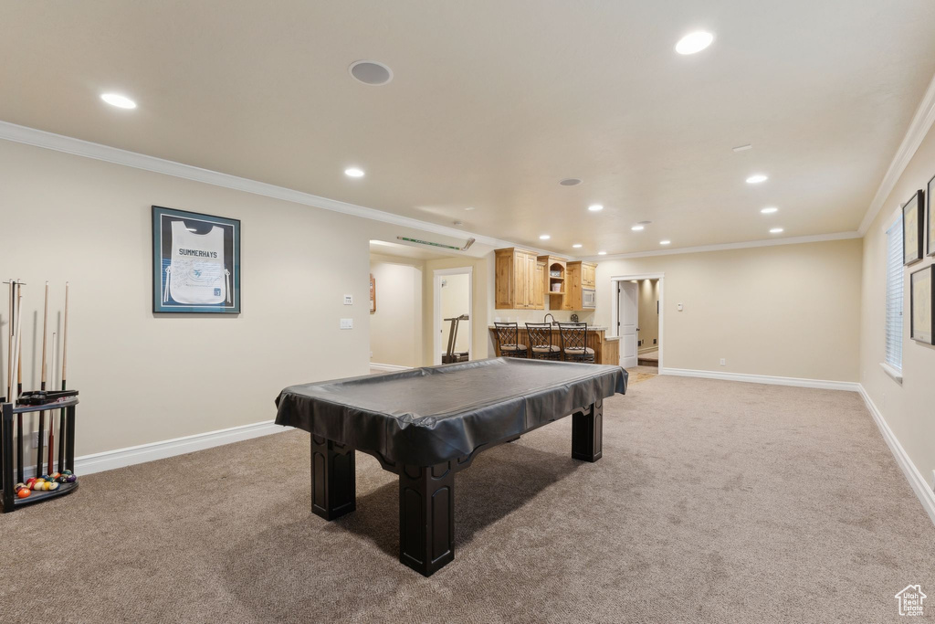 Game room with crown molding, light colored carpet, billiards, recessed lighting, and baseboards