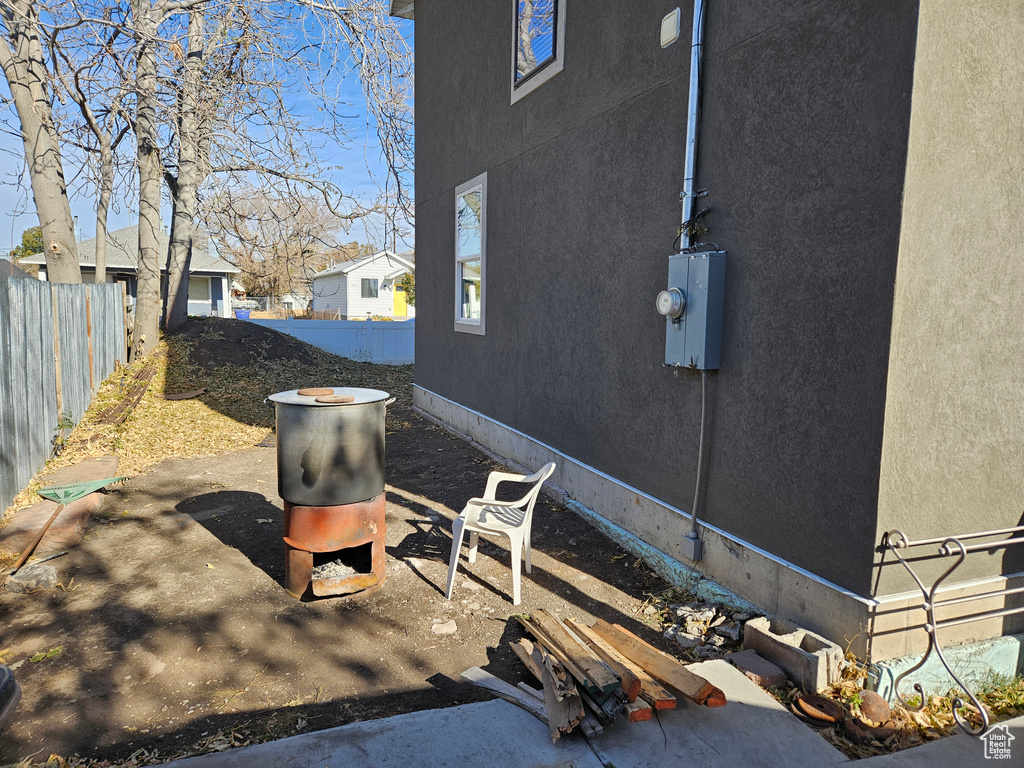 View of patio with fence