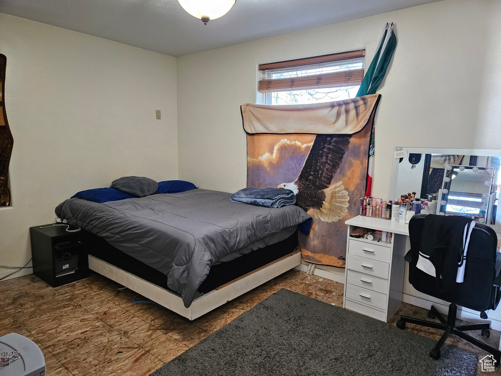 Bedroom featuring an office area