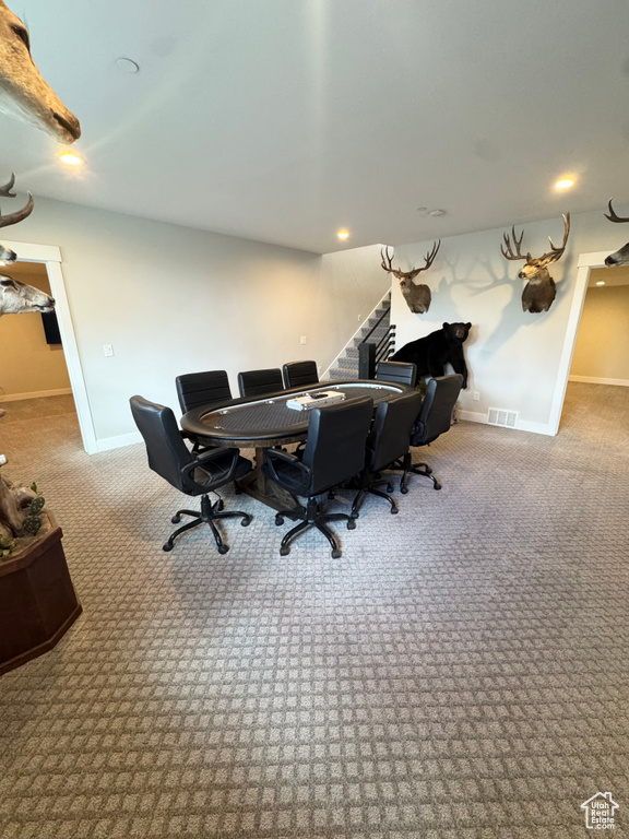 Home office featuring carpet flooring and baseboards
