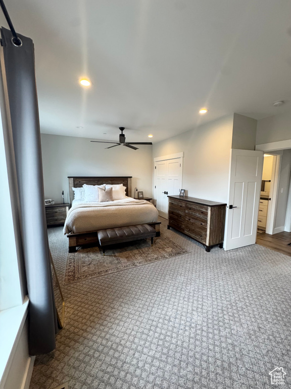 Carpeted bedroom featuring recessed lighting and ceiling fan