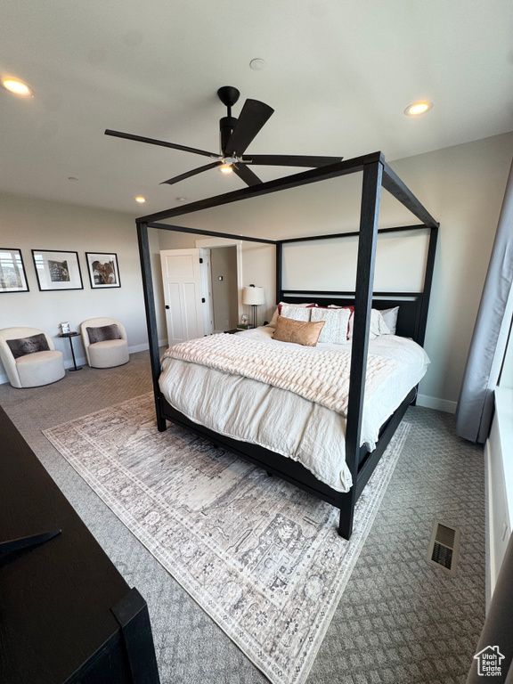 Carpeted bedroom with recessed lighting, baseboards, and a ceiling fan