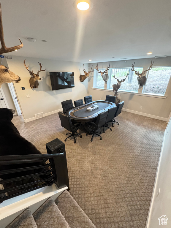 Playroom featuring carpet flooring and baseboards