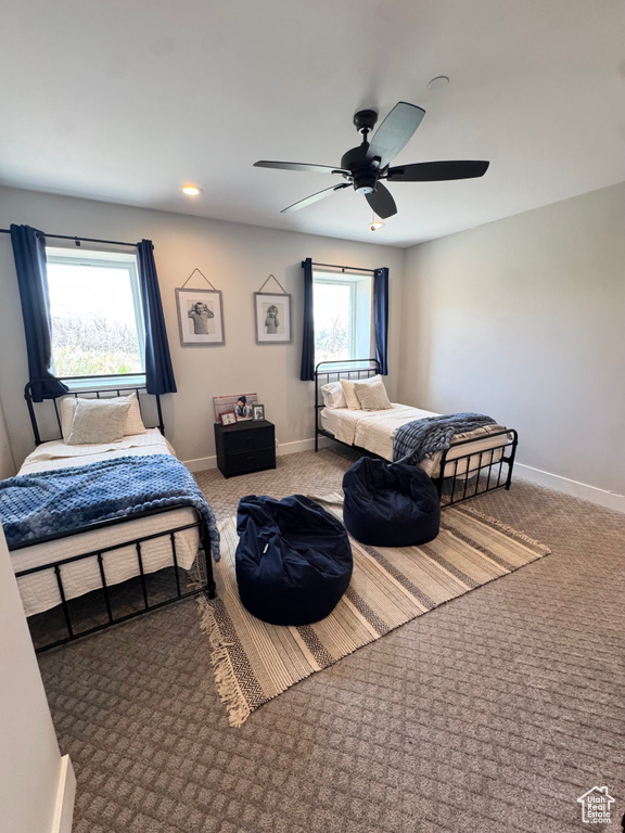 Bedroom featuring carpet flooring, baseboards, ceiling fan, and recessed lighting