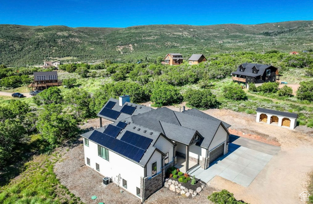 View from above of property featuring a mountain backdrop