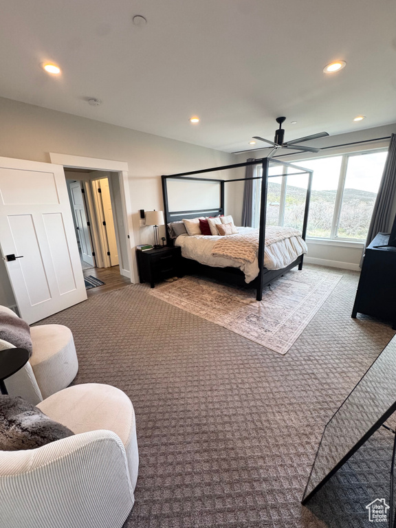 Bedroom with carpet, recessed lighting, and baseboards