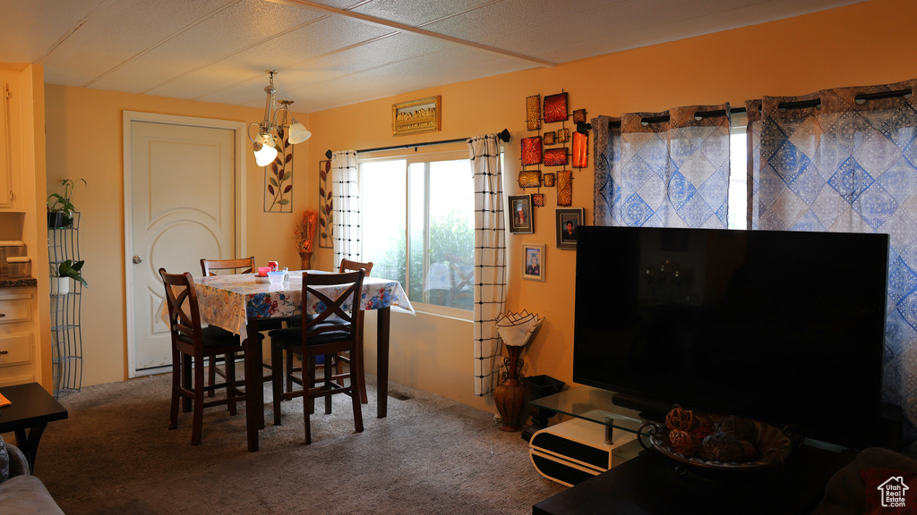 View of carpeted dining room