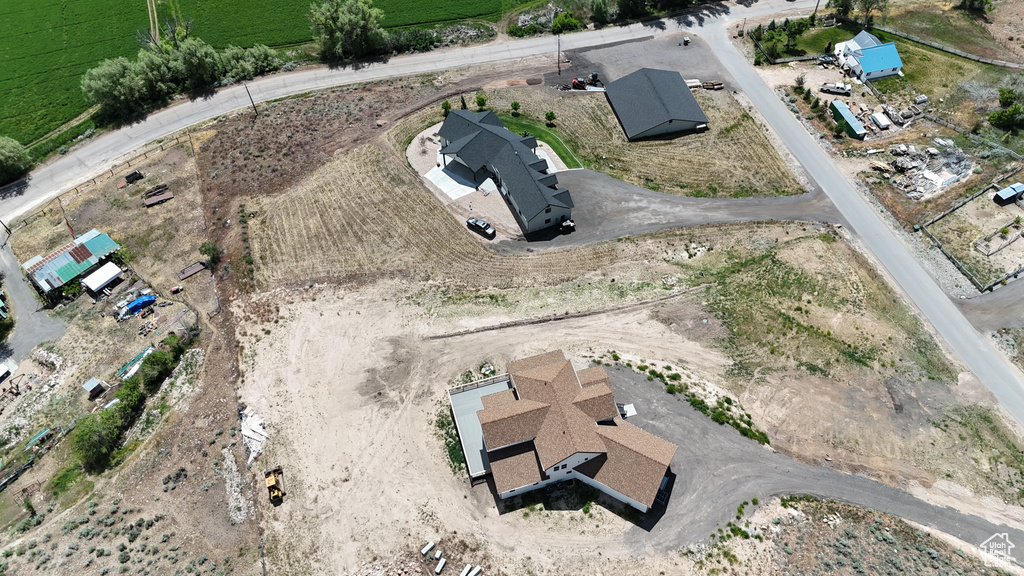 Aerial view of property and surrounding area featuring rural landscape
