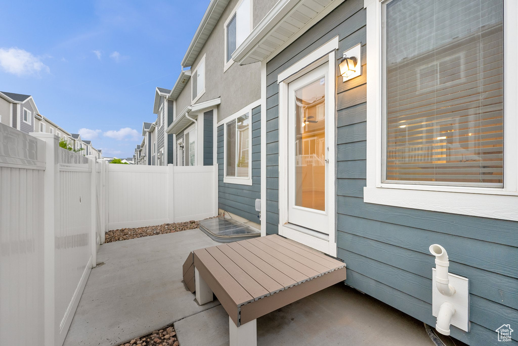 View of patio with fence