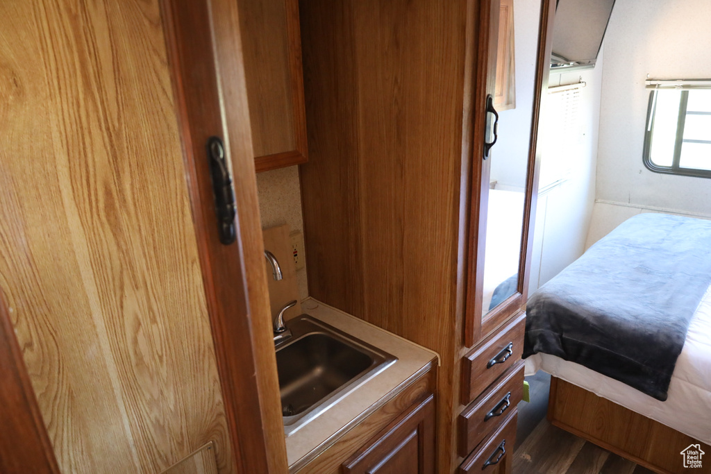 Bedroom featuring a sink