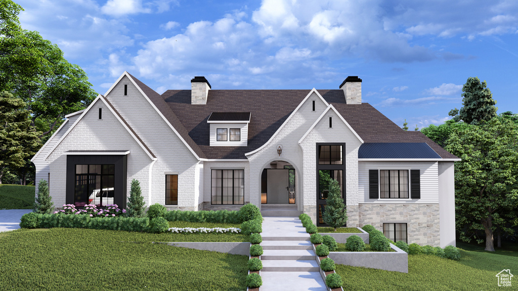 View of front of home with a chimney, a front yard, stone siding, and roof with shingles