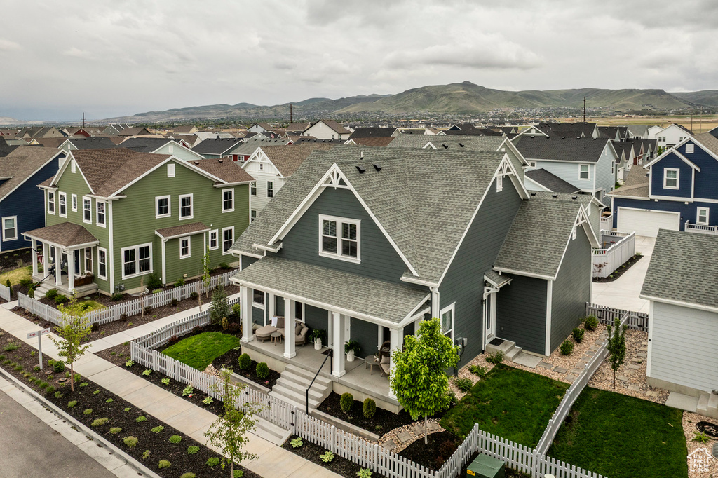Aerial view of residential area with mountains