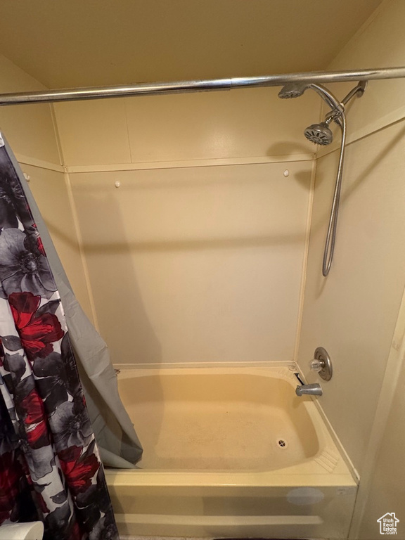 Bathroom featuring shower / tub combo
