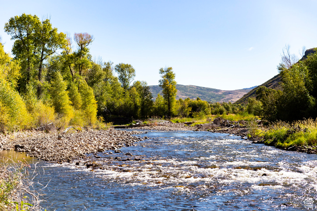 Water view with a mountainous background