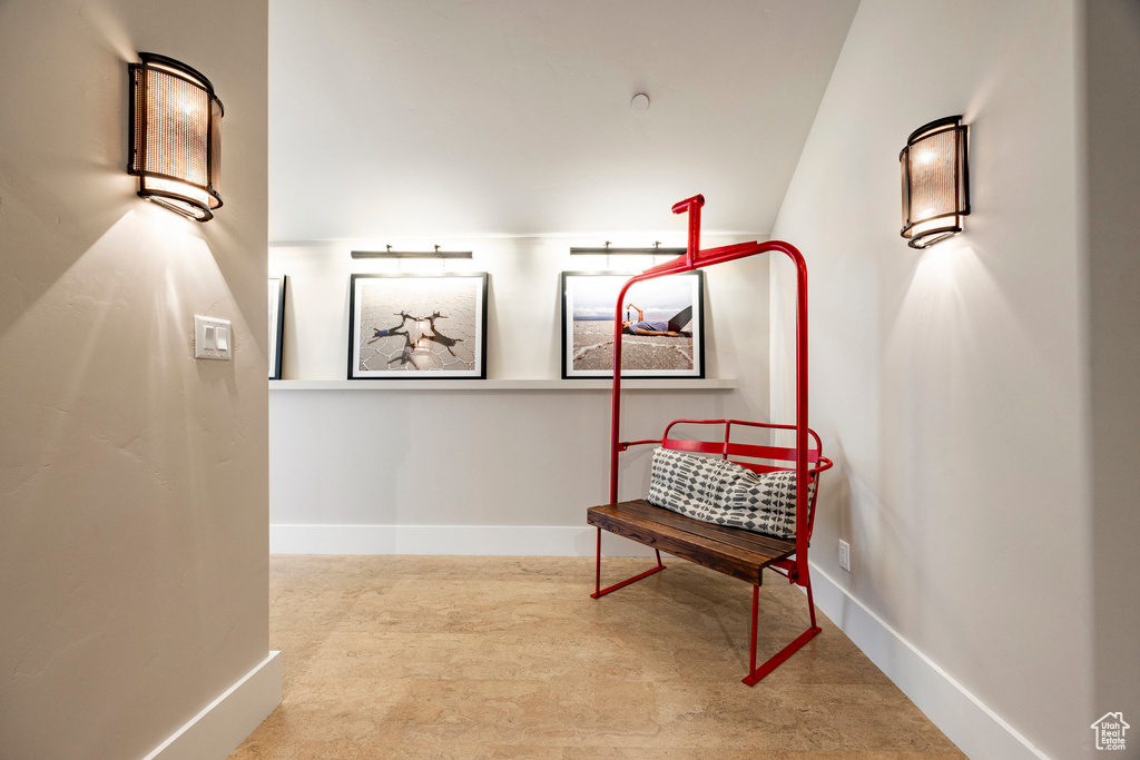 Hallway featuring baseboards