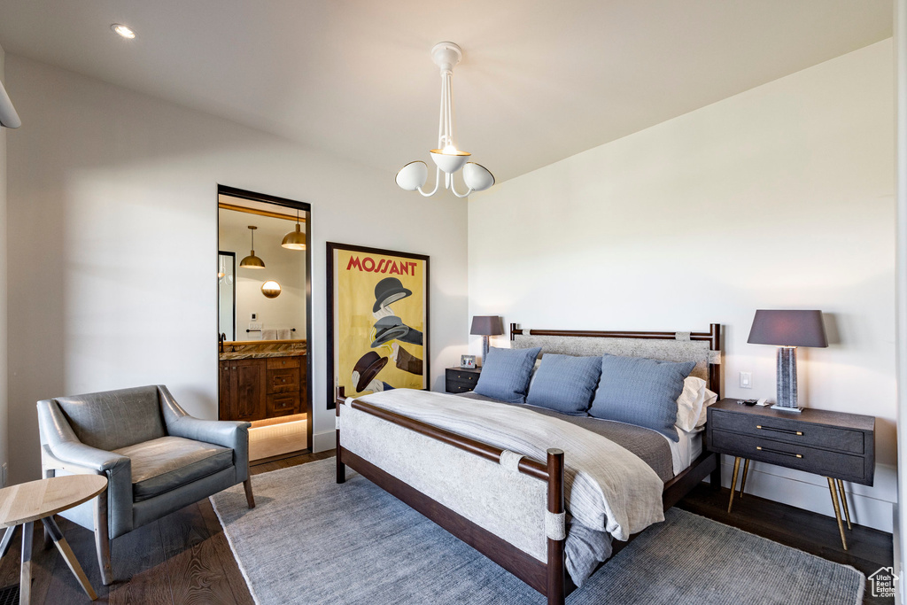 Bedroom featuring wood finished floors, baseboards, and recessed lighting