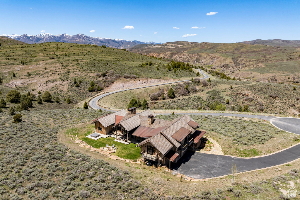 View of subject property with a mountainous background