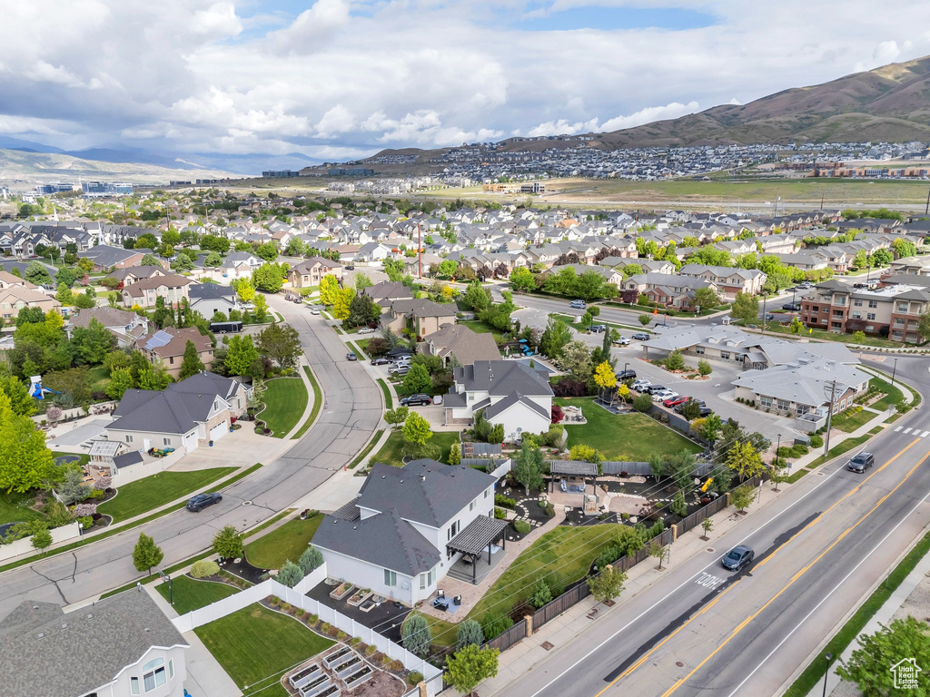 View of property location featuring nearby suburban area and a mountain backdrop