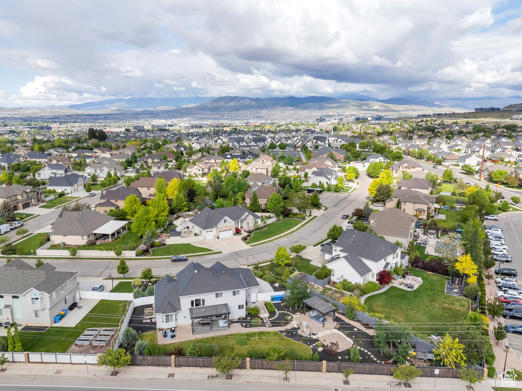 Aerial view of residential area with a mountain backdrop