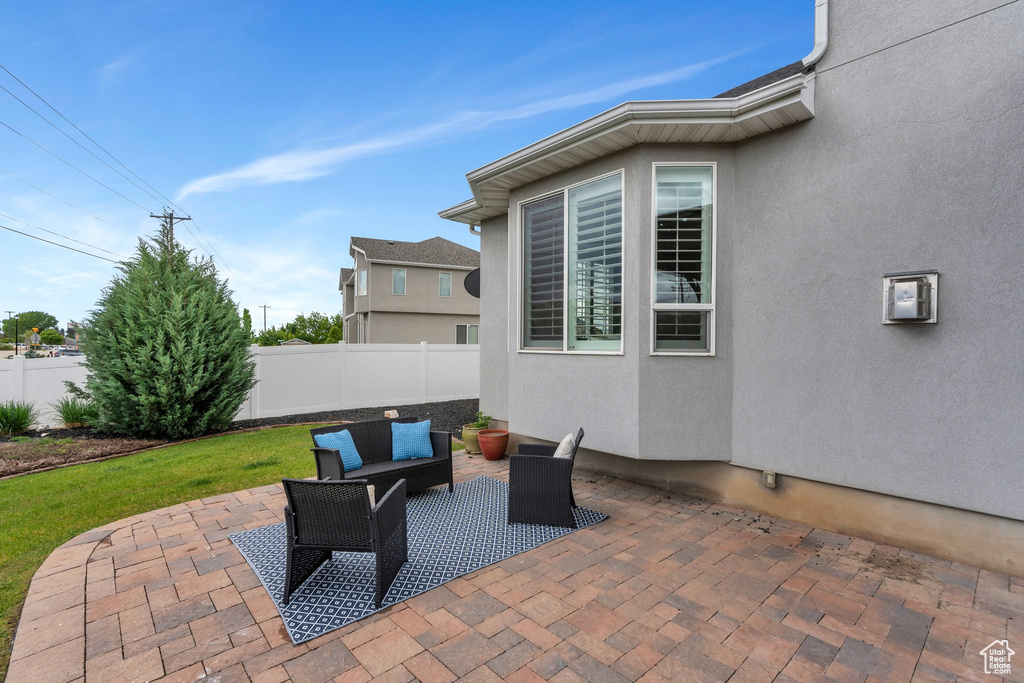 View of patio / terrace featuring a fenced backyard and an outdoor living space