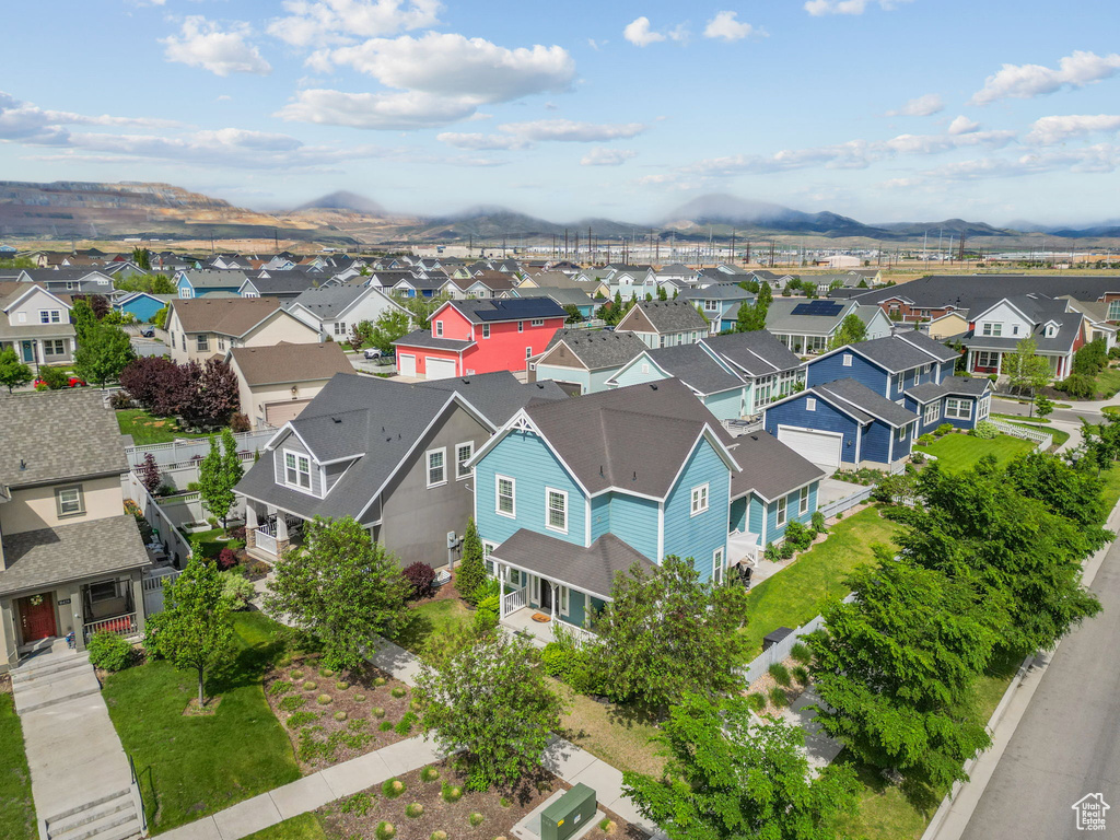Aerial view of residential area with a mountainous background