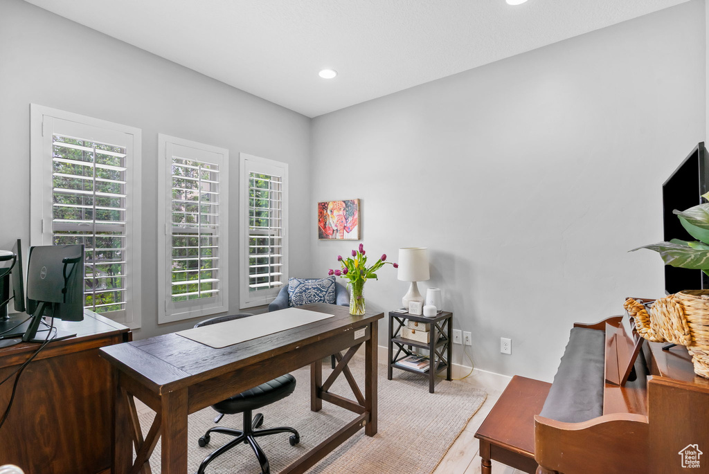 Office area featuring recessed lighting and baseboards
