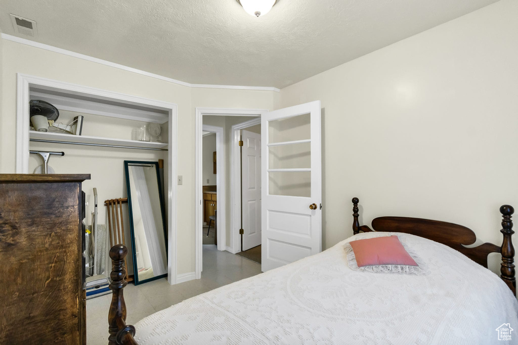 Bedroom with crown molding