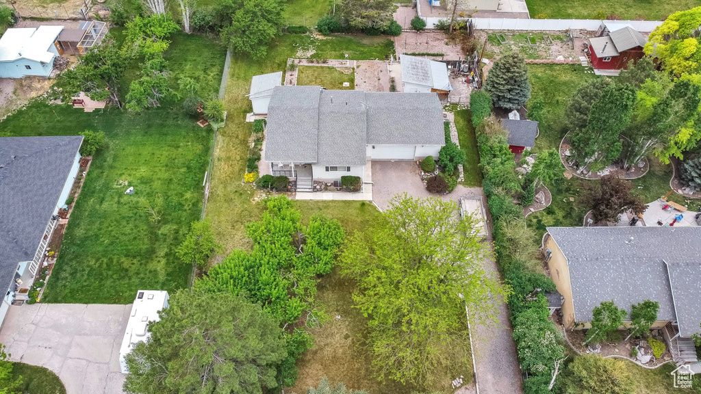 Aerial overview of property\'s location featuring nearby suburban area