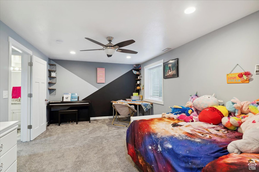 Carpeted bedroom featuring recessed lighting, a ceiling fan, baseboards, and connected bathroom