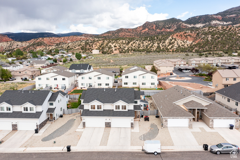 Aerial perspective of suburban area with mountains