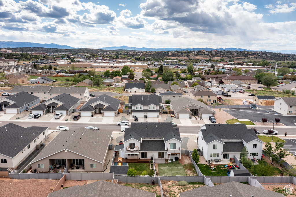 Aerial view of residential area with a mountain backdrop