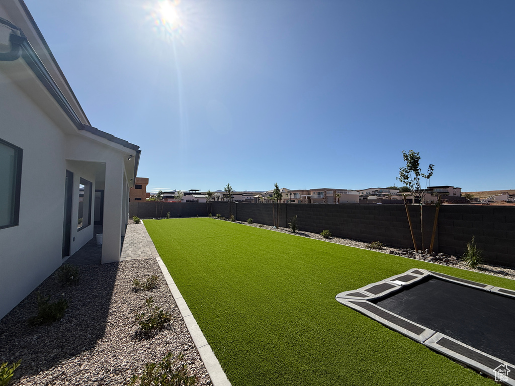 View of yard with a patio area