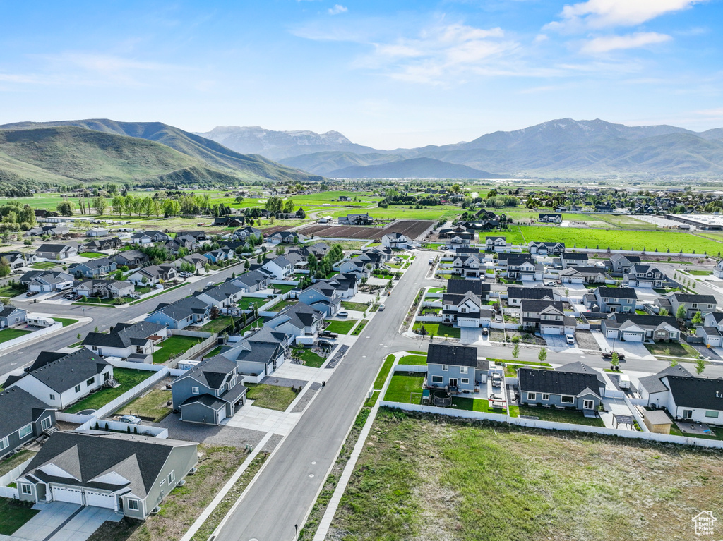 Aerial view of residential area with a mountain backdrop