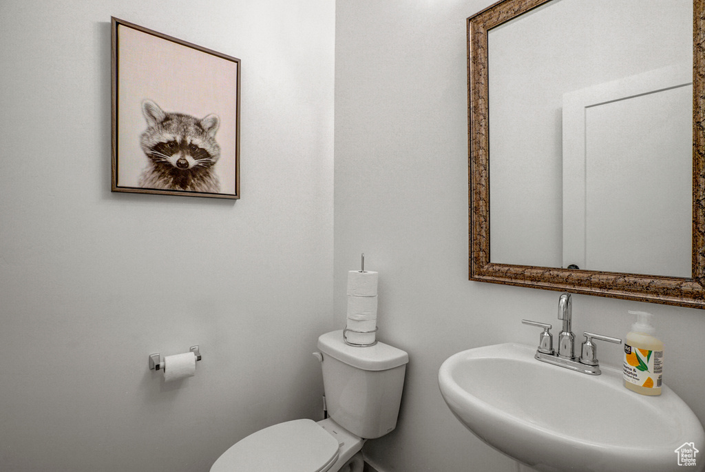 Bathroom with a sink and toilet
