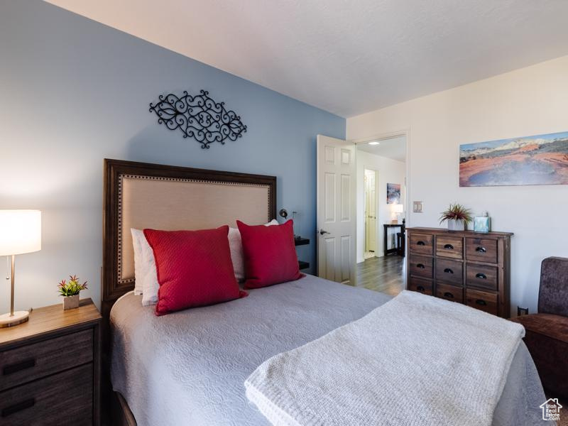 Bedroom with wood finished floors