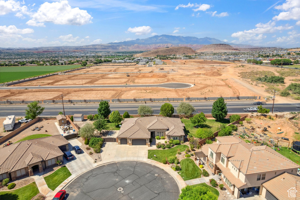 Aerial view of residential area with a mountain backdrop