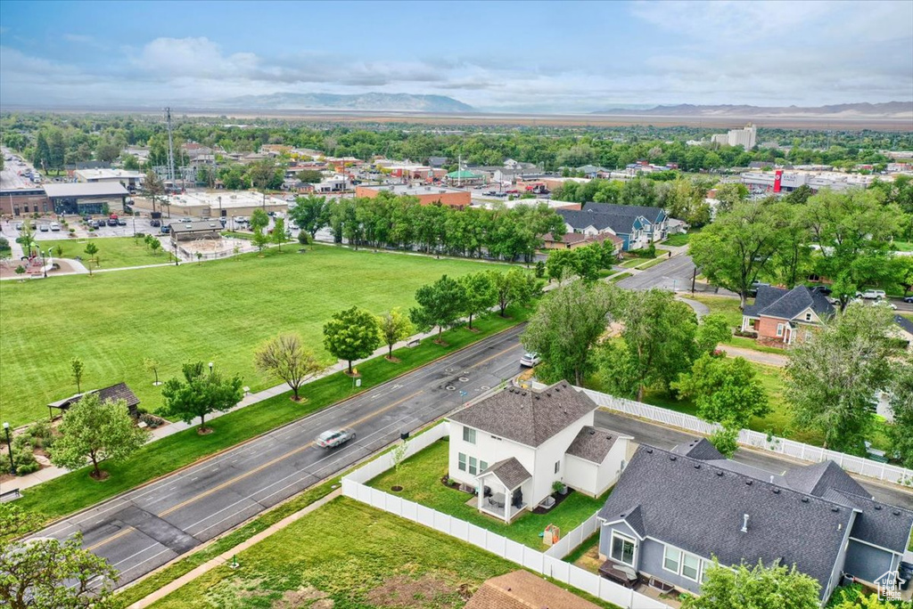 Aerial view of residential area featuring a mountain backdrop