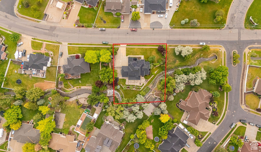Aerial perspective of suburban area with property parcel outlined