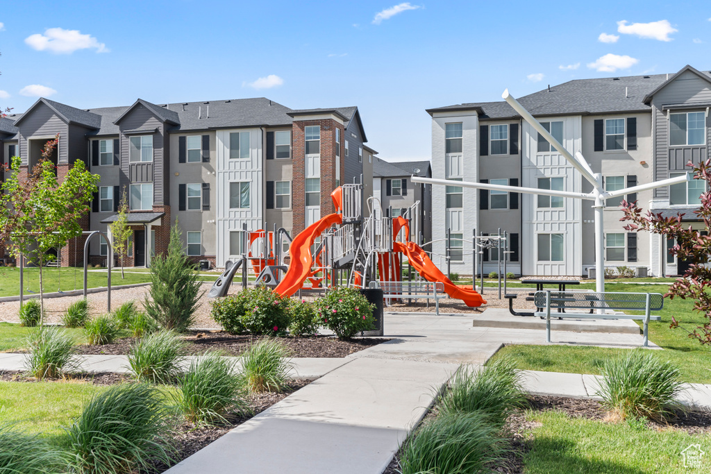 Communal playground featuring a residential view