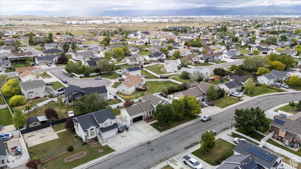 Aerial view of property\'s location featuring nearby suburban area