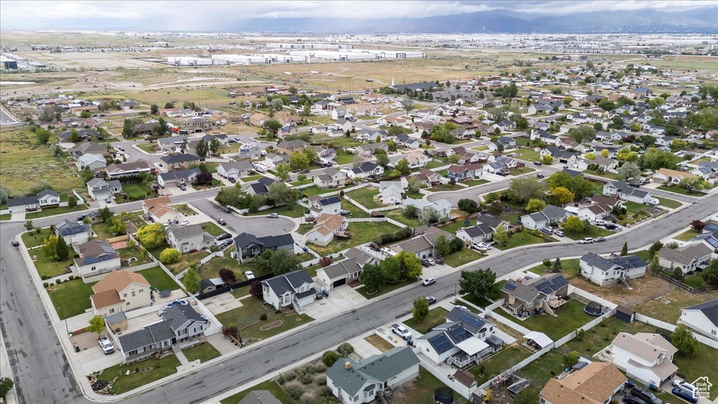 Aerial overview of property\'s location with nearby suburban area