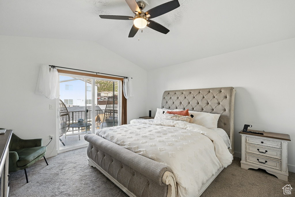 Bedroom featuring carpet flooring, access to outside, lofted ceiling, and ceiling fan