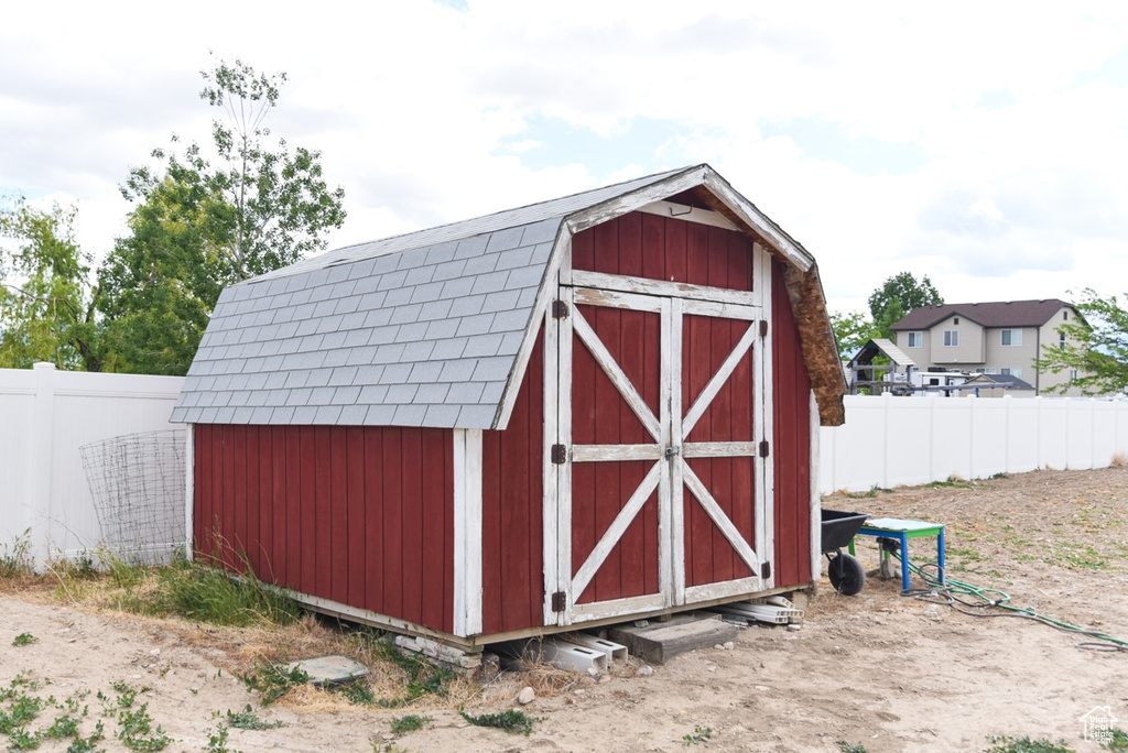 View of shed with fence
