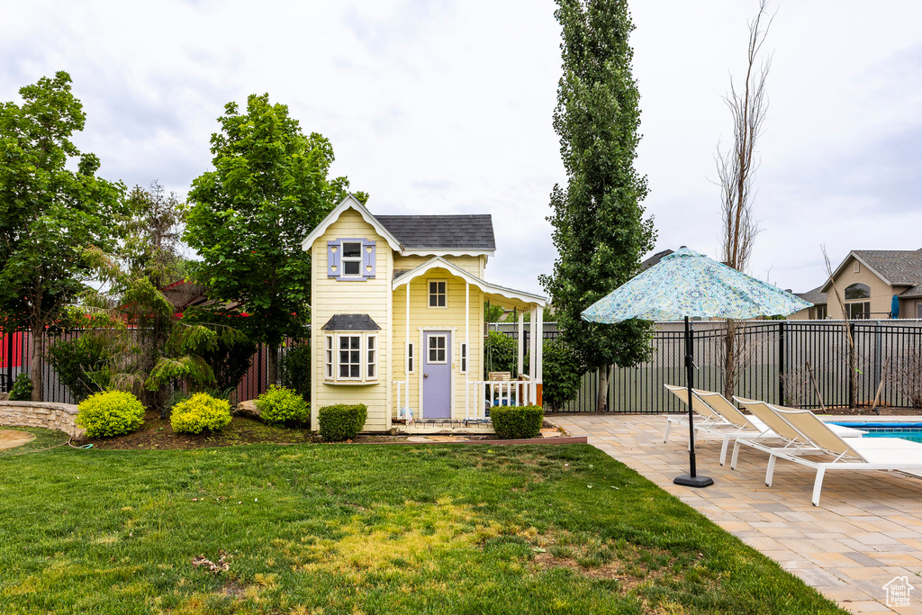 View of outbuilding with an outdoor structure