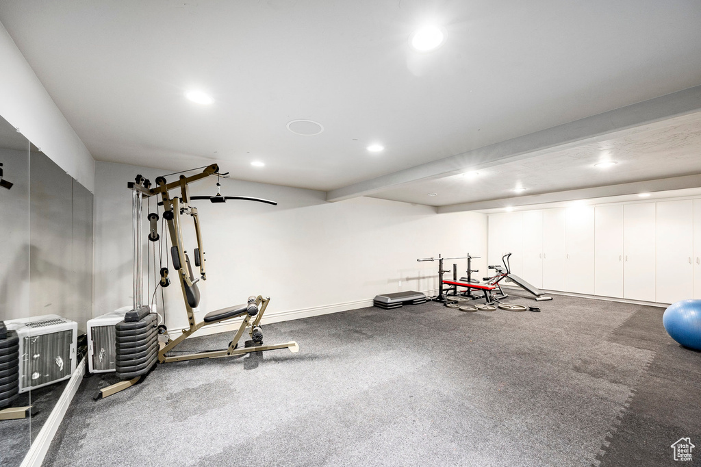 Exercise room featuring recessed lighting and baseboards