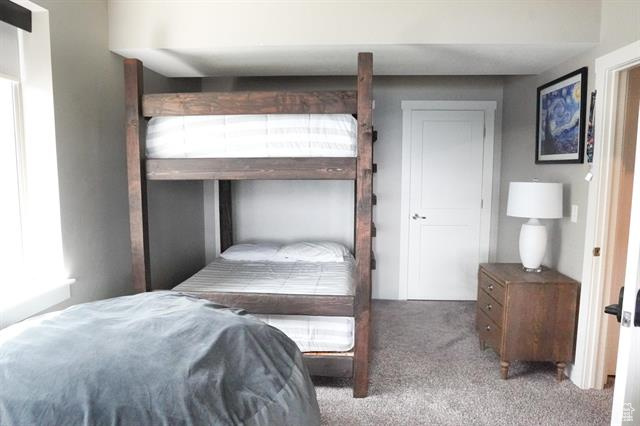 Bedroom with carpet