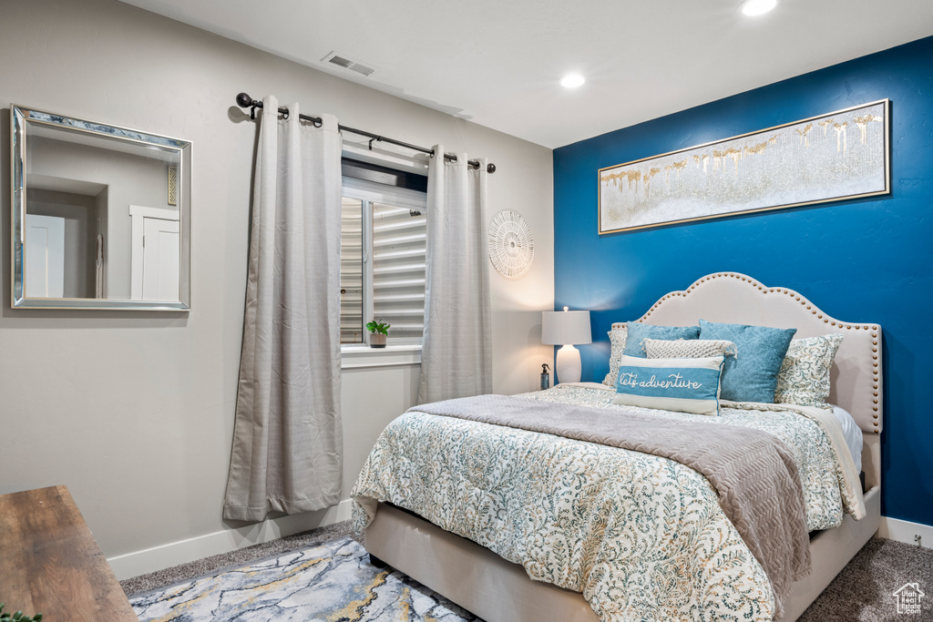 Bedroom featuring baseboards and recessed lighting