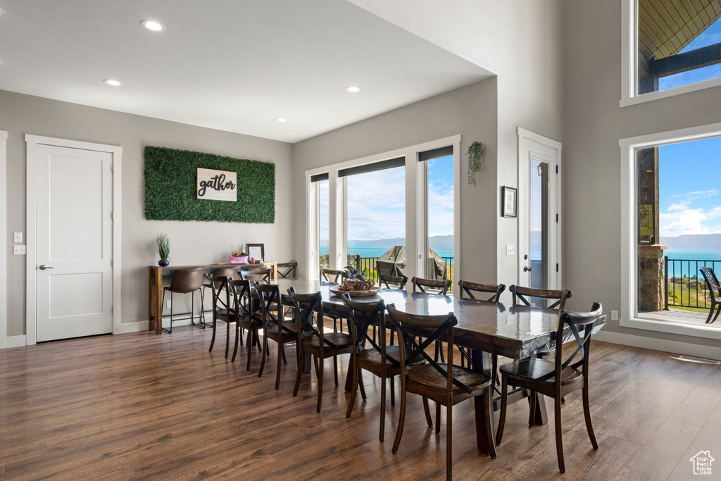 Dining area featuring wood finished floors and recessed lighting