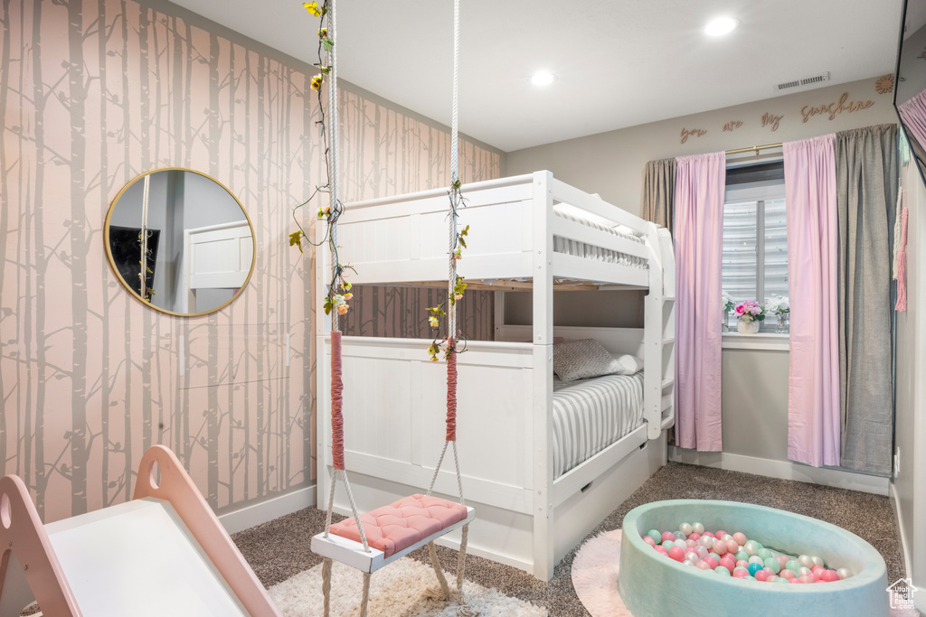 Bedroom with recessed lighting and baseboards
