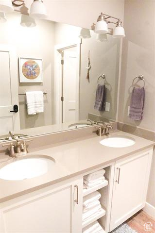 Bathroom featuring double vanity
